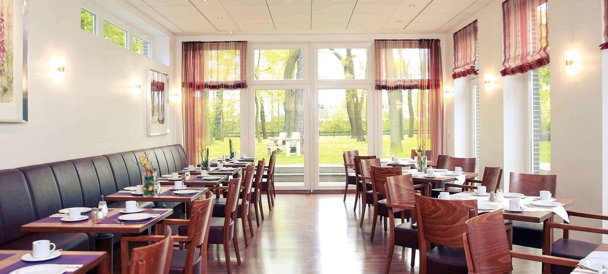 Hotel mit Garten, Restaurant und Fitness. 16